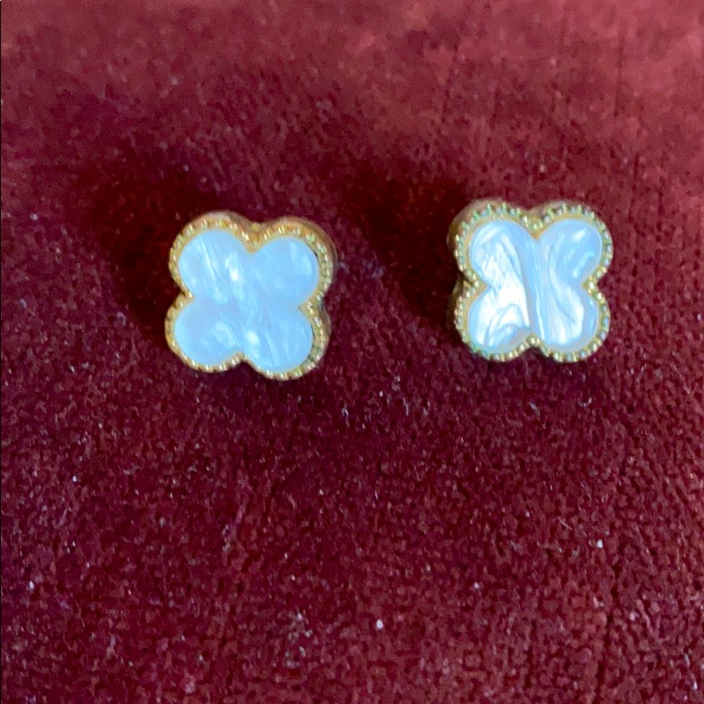 Earrings i.e. Van Cleef & Arpels